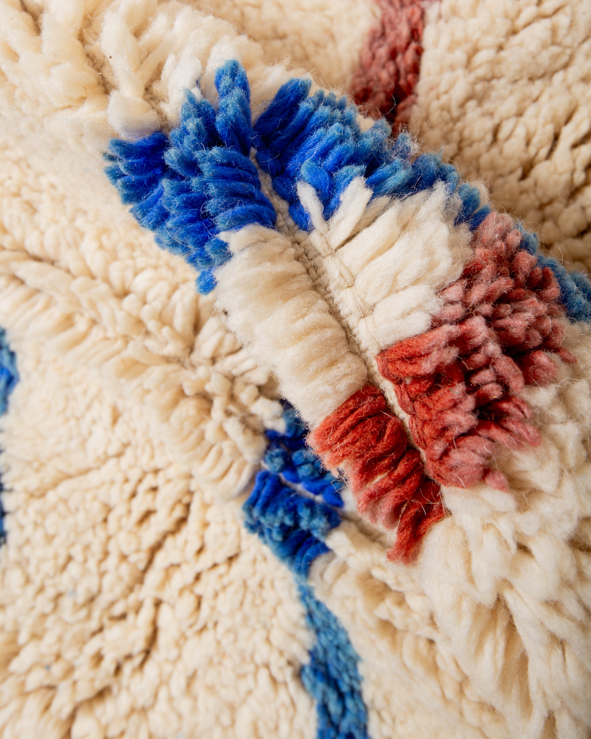 Modern, designer, handcrafted Berber rug from Morocco. Beniourain carpet with beautiful colours and patterns and fluffy wool texture.